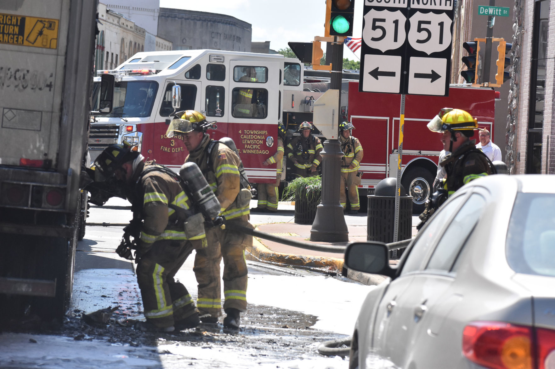 Firefighters on fire scene in Portage